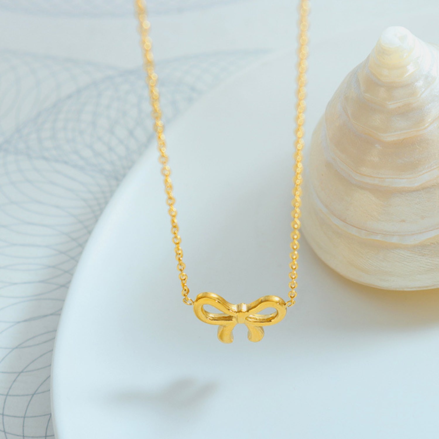 Gold-Plated Titanium Steel Bow Pendant Necklace - Bella Blue Styles